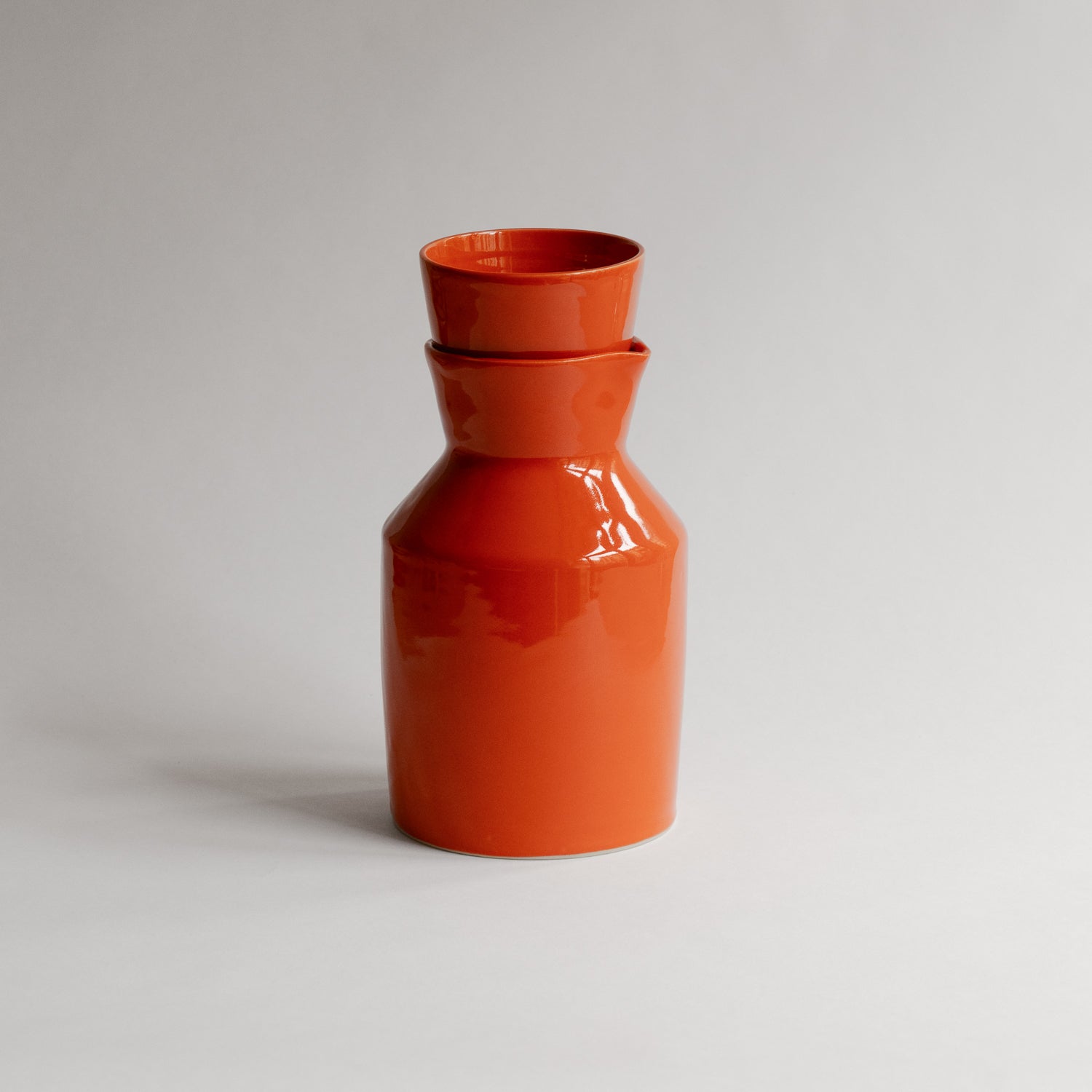 The picture shows the new carafe and a mug in the new spring orange. 