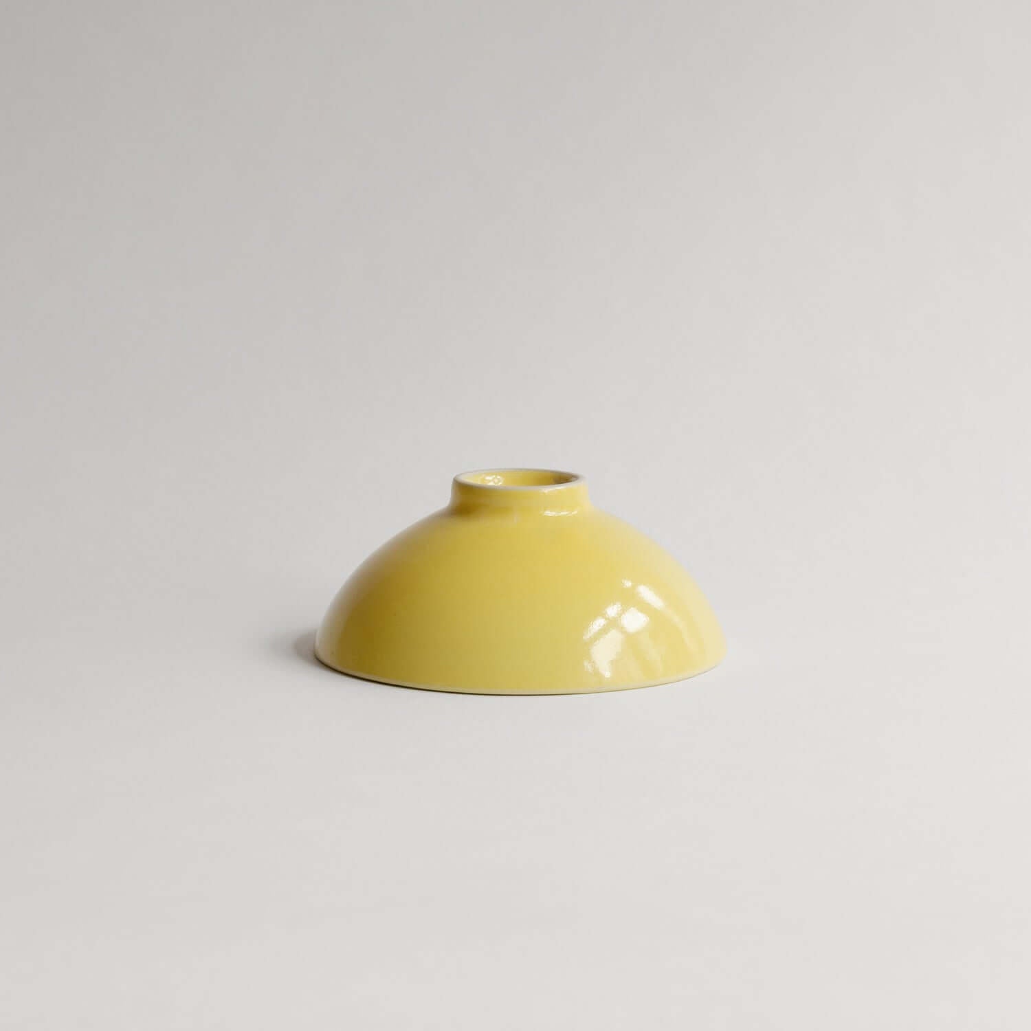 Shop our unique 13cm Yellow Bowl, handcrafted from grey stoneware with a yellow glaze. Each piece is a one-of-a-kind symbol of love from our studio. von viola beuscher ceramics