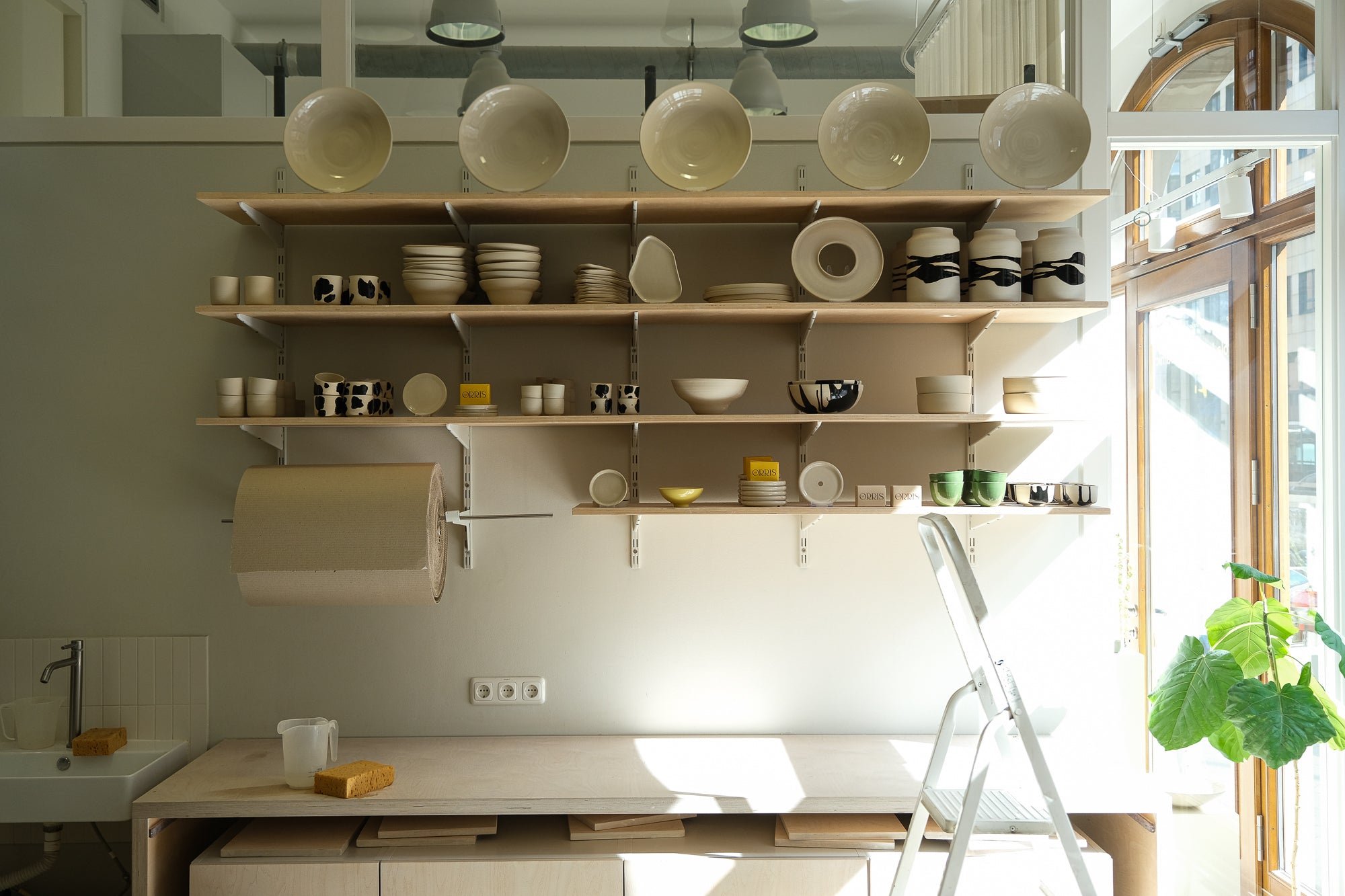 This picture shows the shelf in our studio. The shelves are full of products from our Core Collection. 