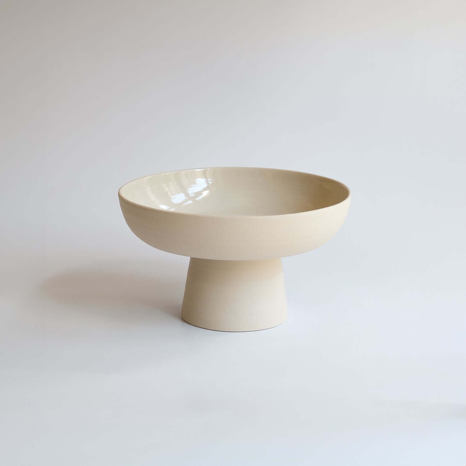 Unique Aleah Bowl, perfect as a decorative fruit bowl or vase for kenzan. Handcrafted, raw stoneware with glossy glaze, 15x20 cm. from viola beuscher ceramics